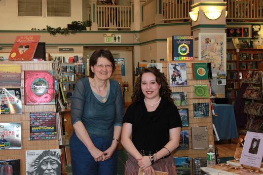 Emmaline Hoffmeister with employee of Auntie's Bookstore in Spokane, Washington